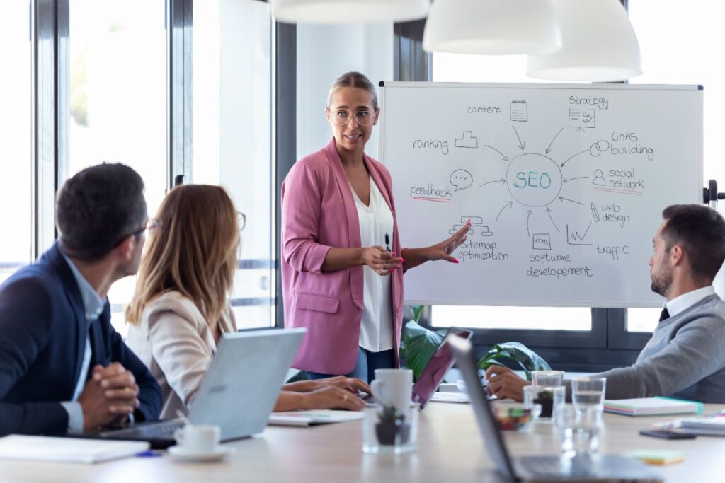 young-professional-explaining-about-seo-to-colleagues