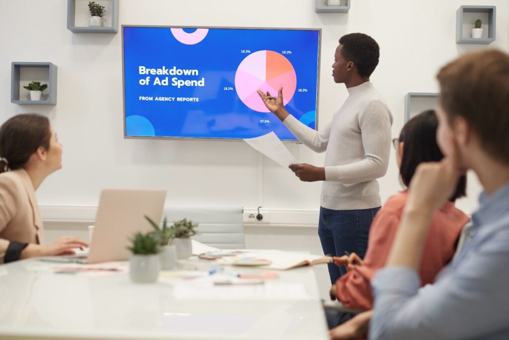 Businessman Giving Presentation on Social Media Campaigns