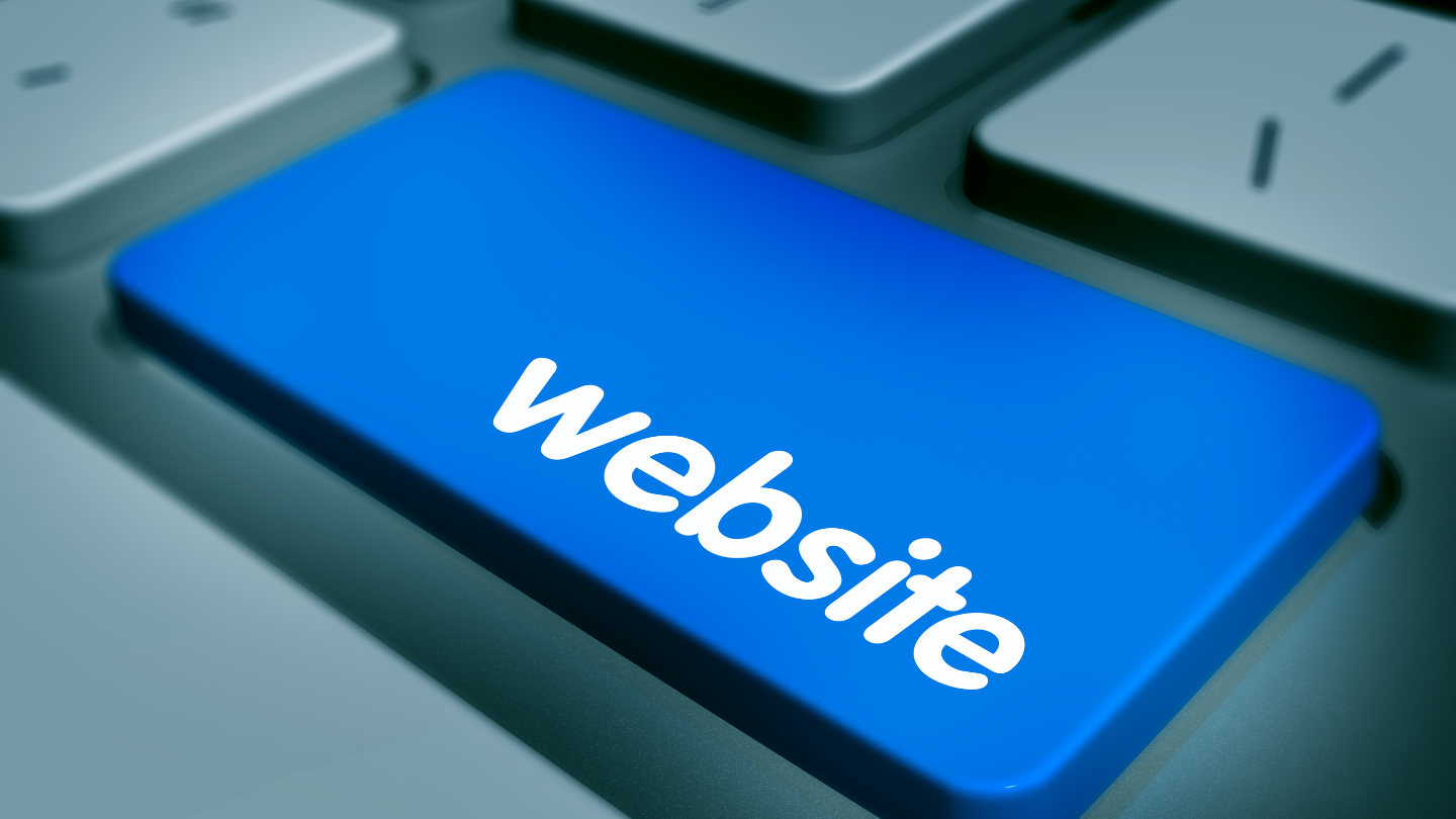 Close-up of a computer keyboard featuring a prominent blue key labeled 'website' in white lowercase text.